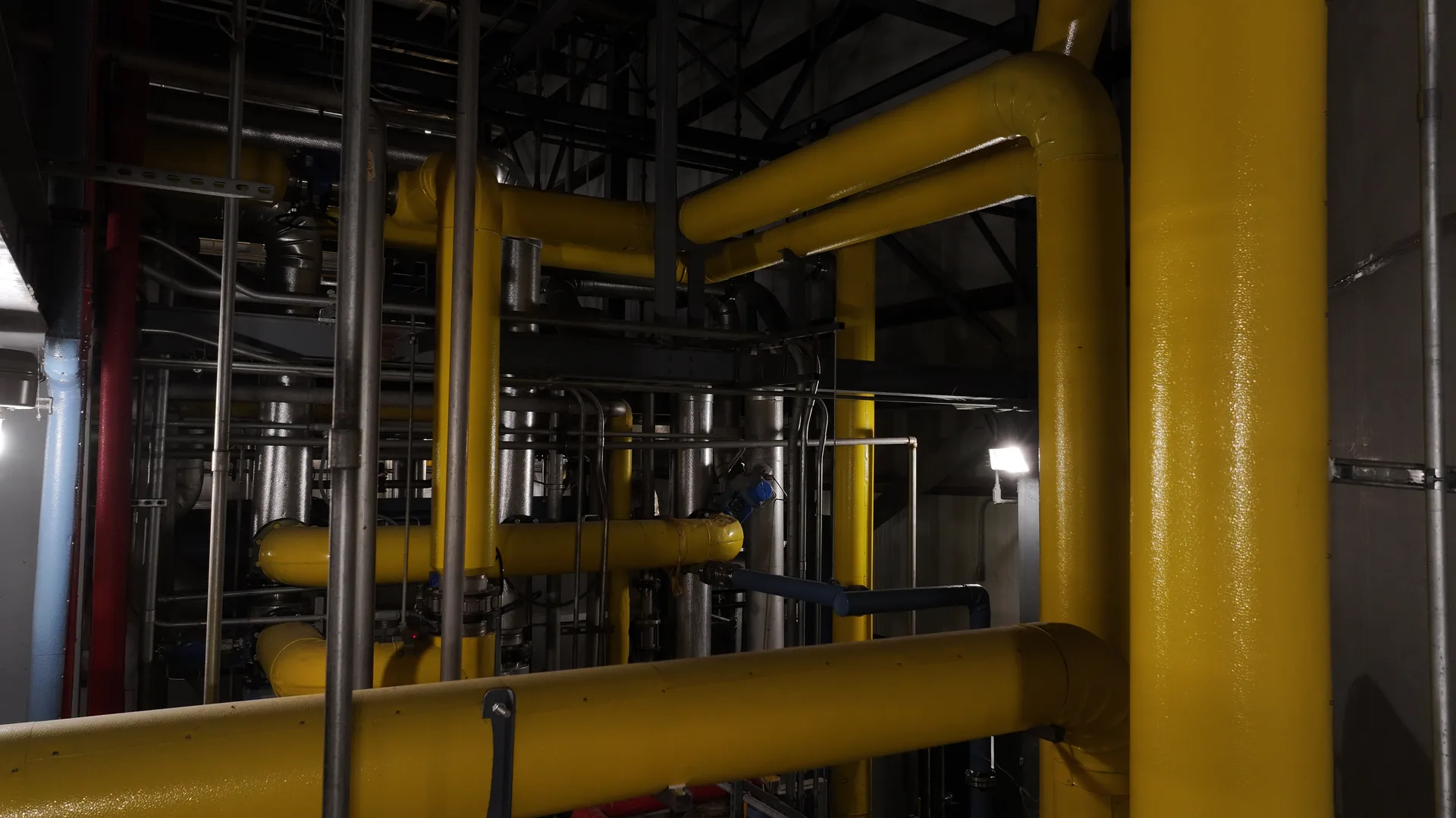 Network of insulated yellow process piping